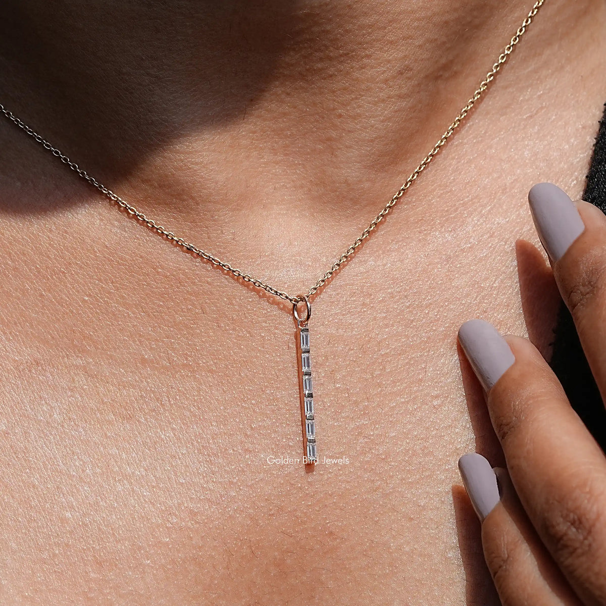 In front view of moissanite Baguette cut pendant