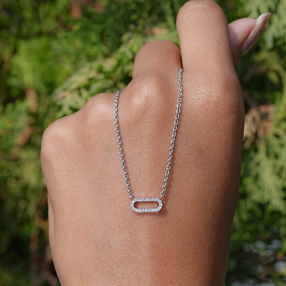 In Hand Back View of Round Cut Lab Diamond Pendant In White Gold