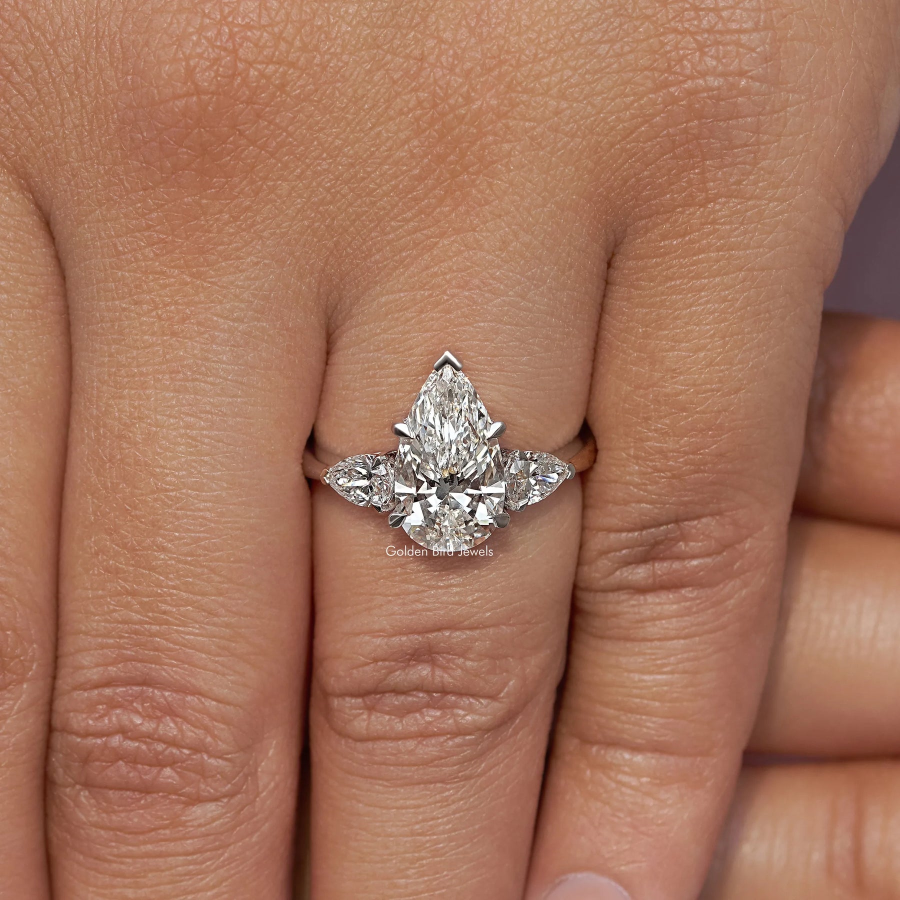View of Pear Cut Diamond Engagement Ring In finger