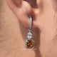 [In ear front view of asscher cut moissanite dangle drop earrings]-[Golden Bird Jewels]