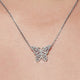 View of colorless butterfly round cut moissanite pendant 