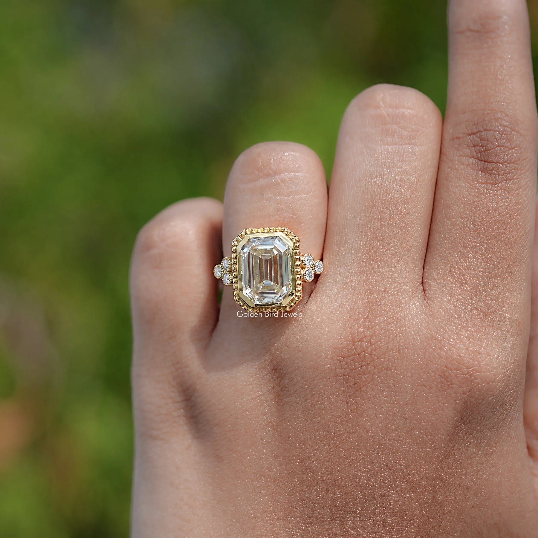 Top View Of Bezel Set Old Mine Moissanite Emerald Cut Ring