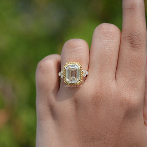 Top View Of Bezel Set Old Mine Moissanite Emerald Cut Ring