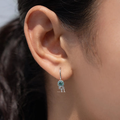 In Ear view of Blue Round Cut Moissanite Diamond Drop Earrings
