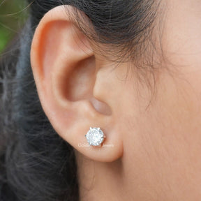 A  Close Up View of a Portuguese Cut Moissanite Wedding Earrings In Six-Prong Setting