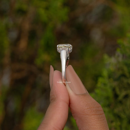 Criss And Trapezoid Cut Three Stone Engagement Ring