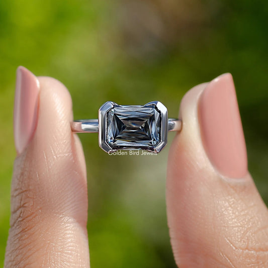 Sterling silver east-west moissanite ring with half bezel setting and square-cut stone