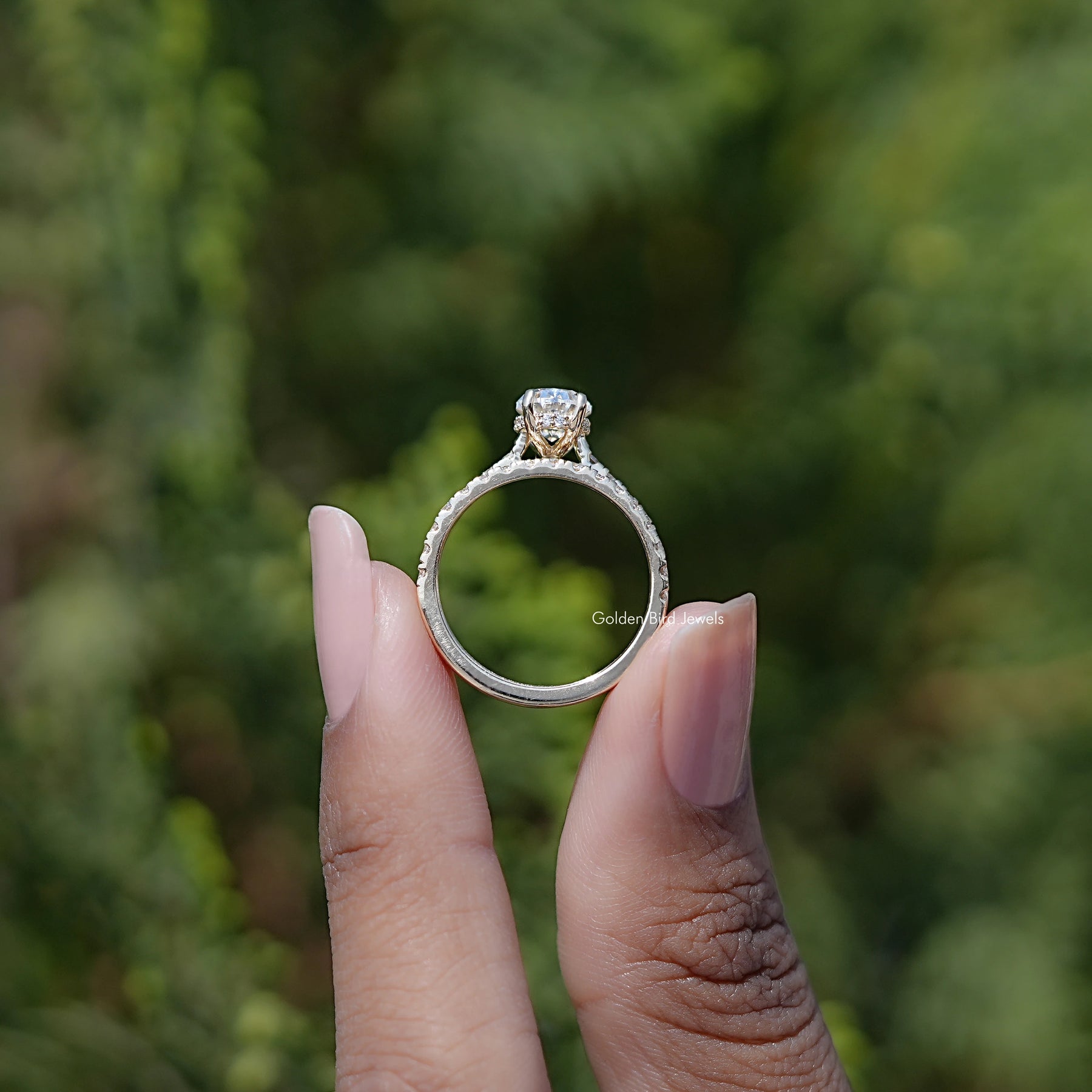 Back view of Oval Cut Moissanite ring in secure setting 
