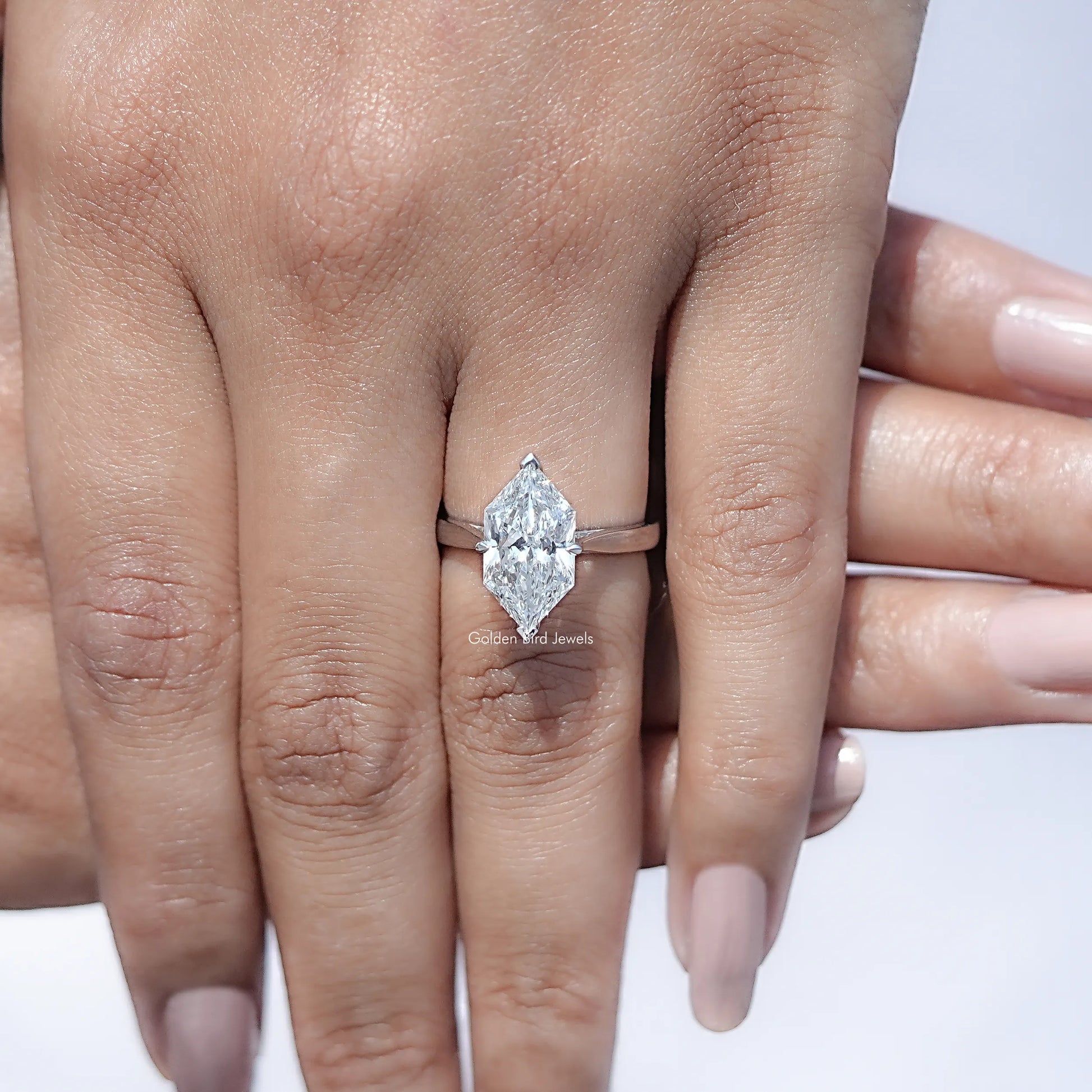 Detailed  View of Marquise Cut Diamond Solitaire Ring in  finger