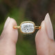 East West Cushion Cut Lab Diamond Bezel Set Ring In Two Fingers