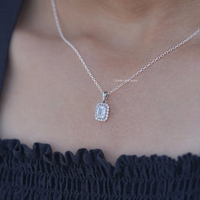 In Neck View of Emerald Cut Lab Grown Diamond Halo Pendant