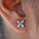 Close Up View Of Marquise Cut Diamond Flower Stud Earrings