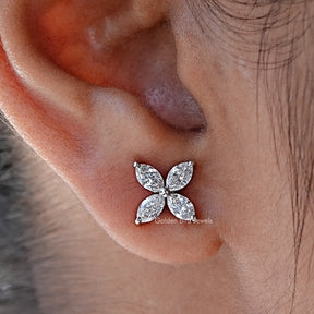 Close Up View Of Marquise Cut Diamond Flower Stud Earrings