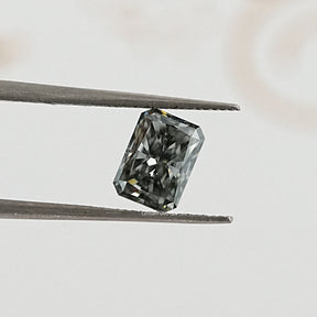 tweezers  View of Radiant Cut loose Moissanite for Anniversary Rings