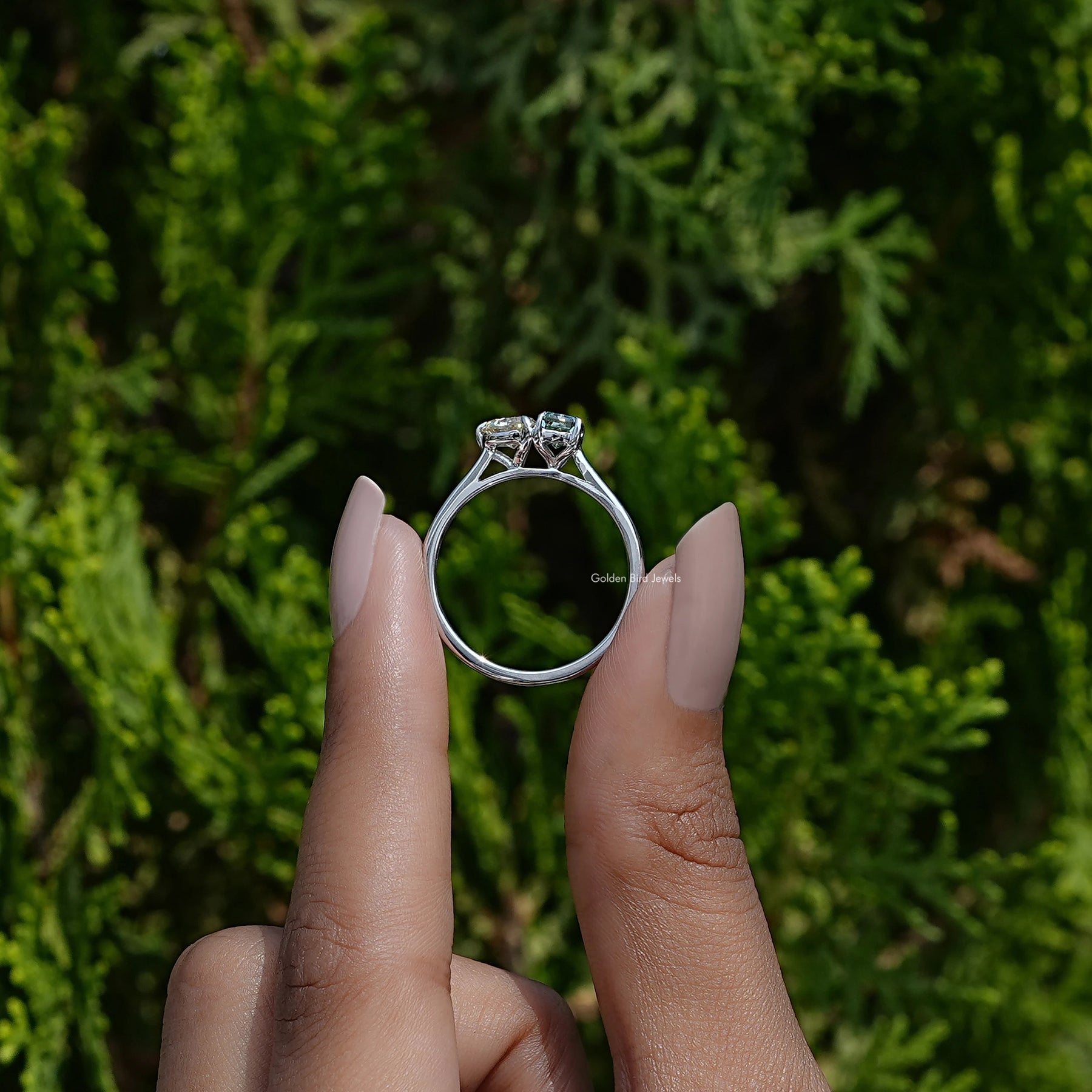 In Finger view of heart and radiant cut moissanite halo Ring  

