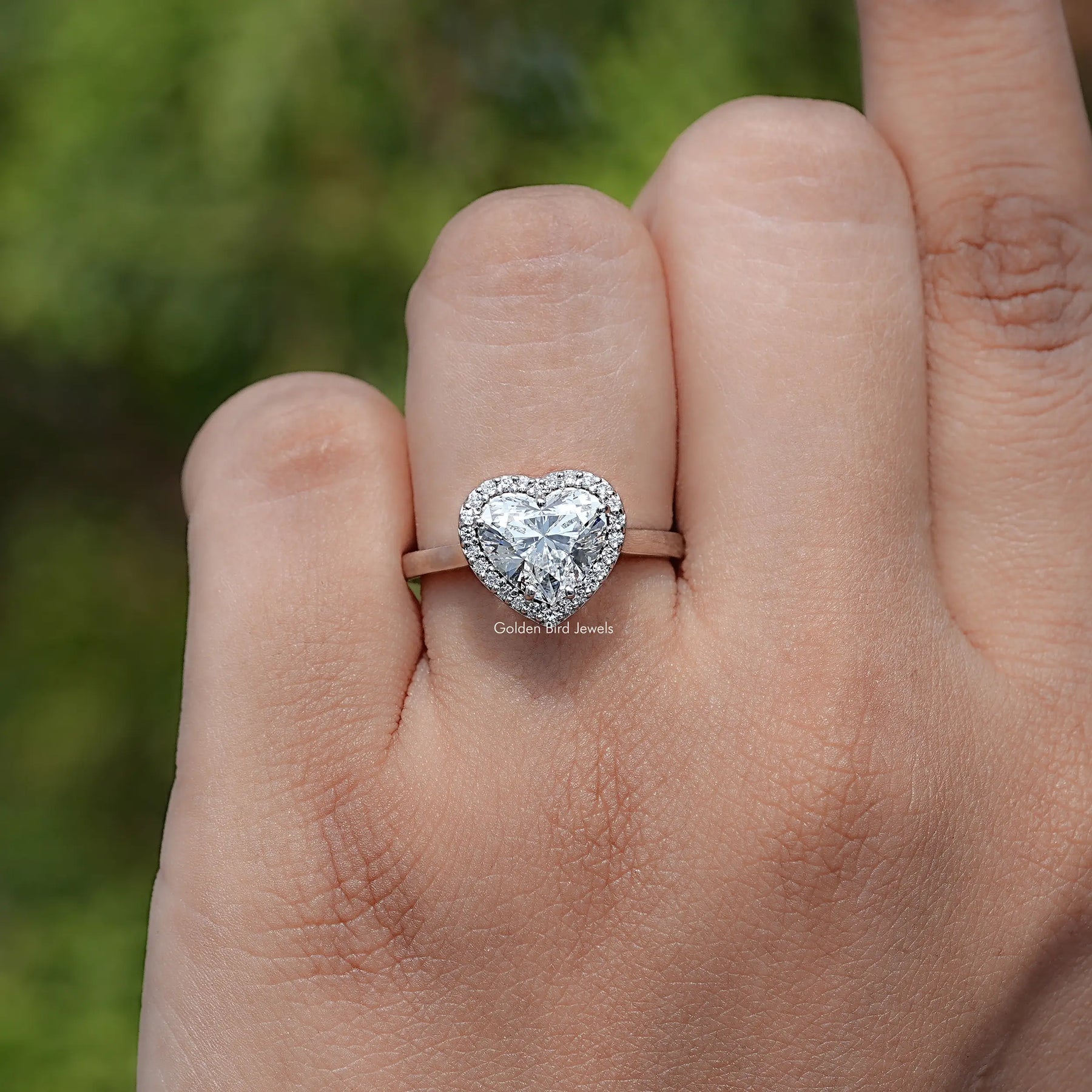 Top View Of Heart shaped diamond engagement ring 
