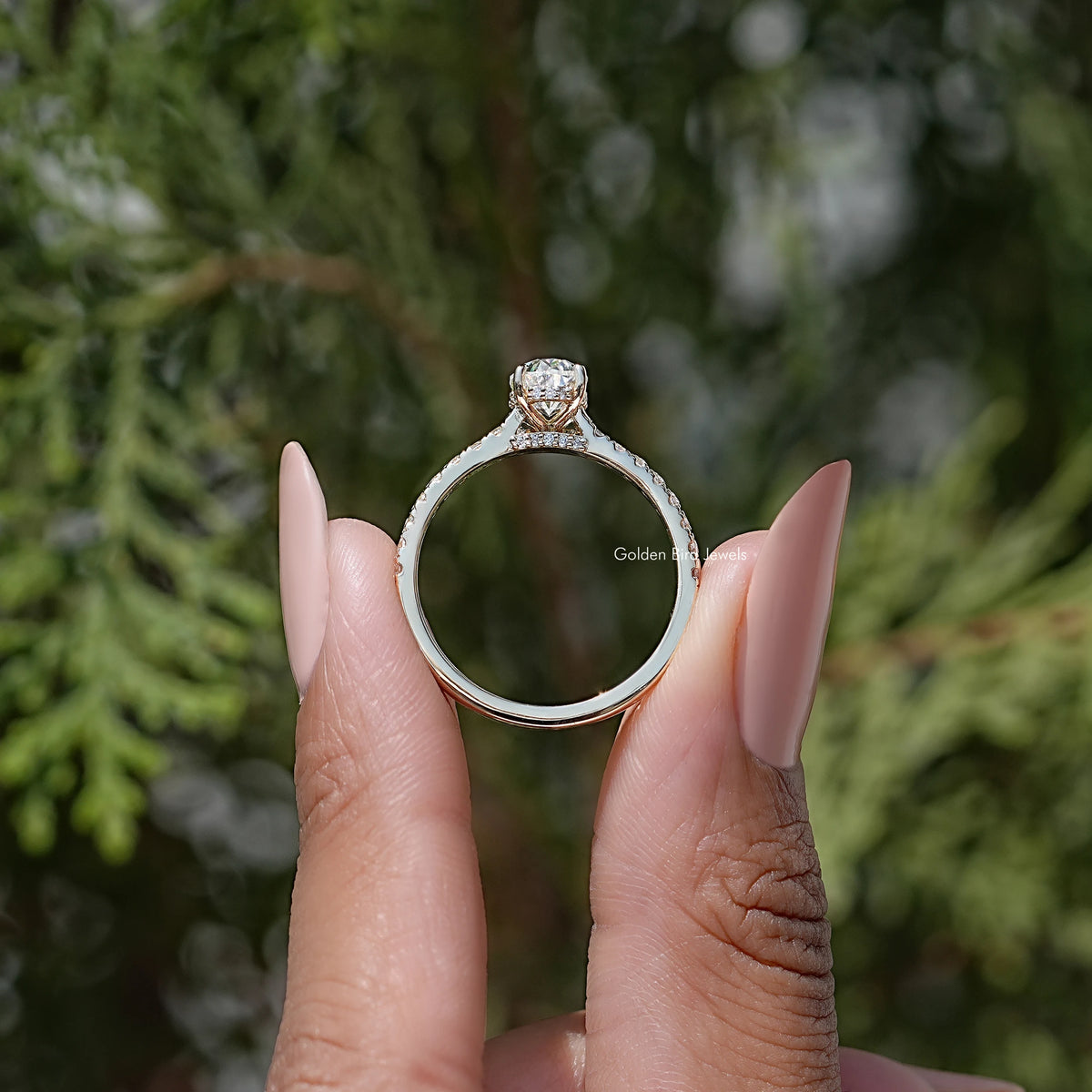 Moissanite oval-cut wedding ring set, side view with solitaire setting
