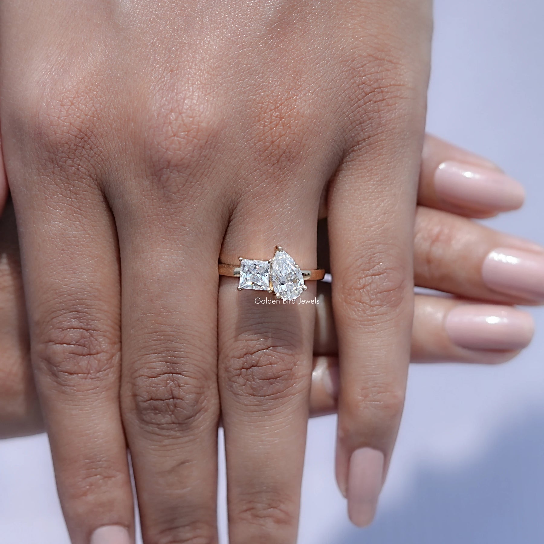 Detailed View Of Pear and Princess Cut Diamond Ring

