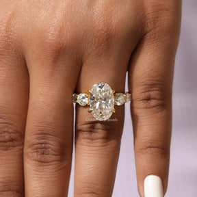 Oval And Round Cut Moissanite Ring In finger