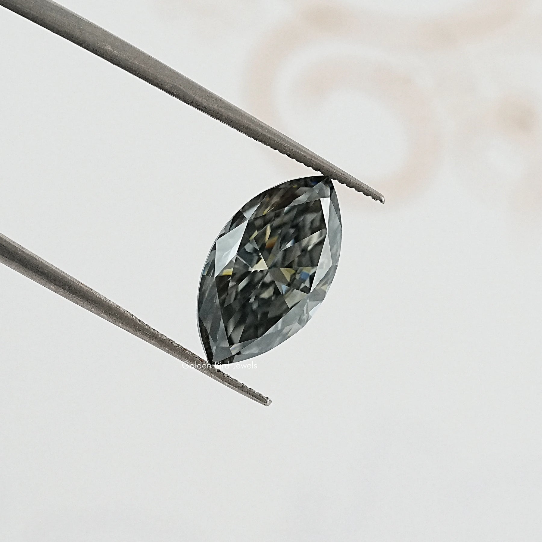 tweezers  View of Marquise Cut Moissanite Loose 