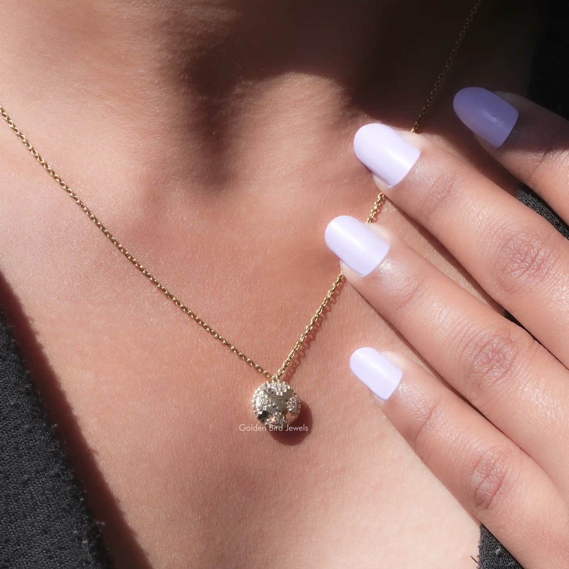 In neck view of cluster moissanite halo pendant 
