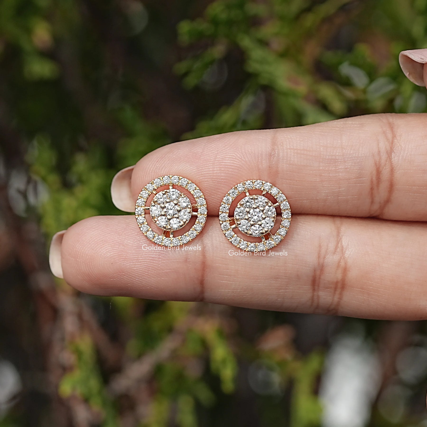 In Hand View Of Round Cut Lab Diamond Stud Earrings
