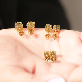 Back  View Of Round European Cut Moissanite Stone earrings in a secure setting 