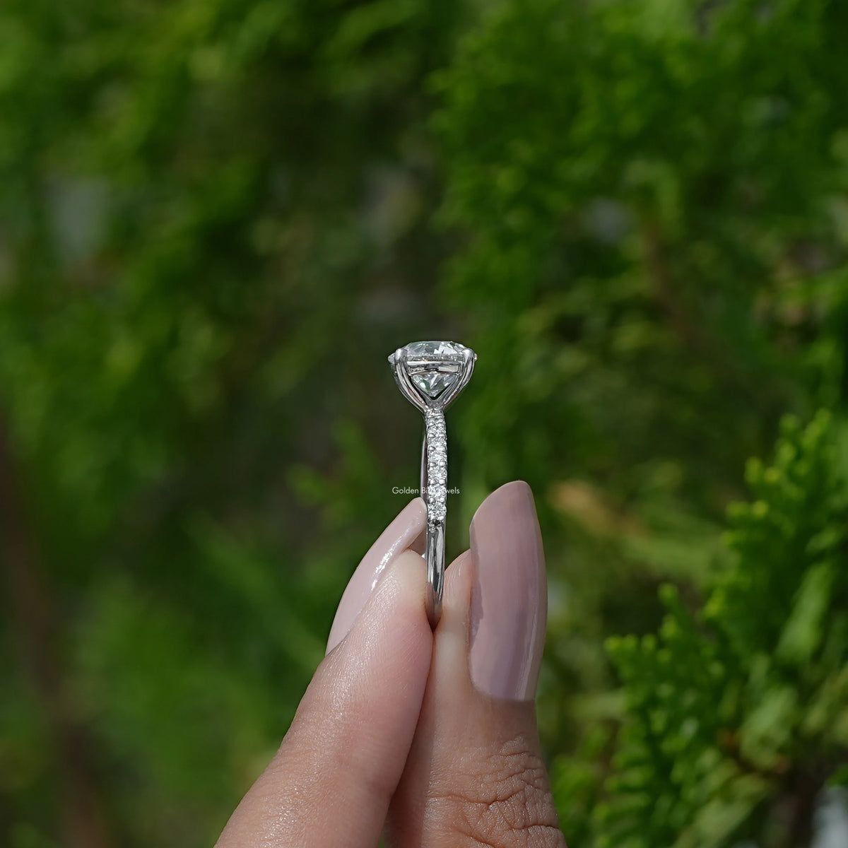 Side View of  Old European Round Diamond Ring on two fingers