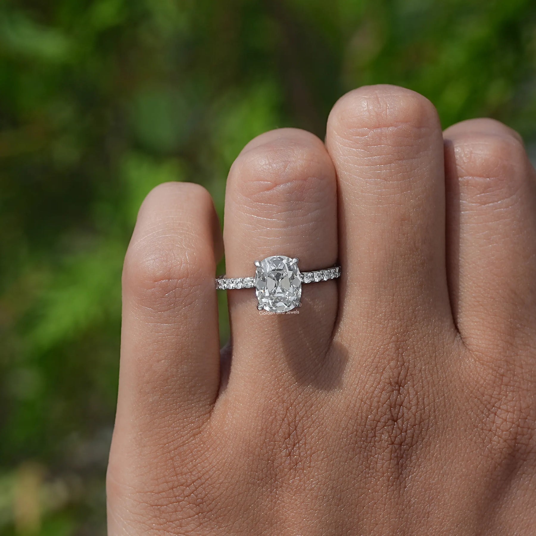 Back view of a Solitaire Accent Diamond Ring in prongs setting 
