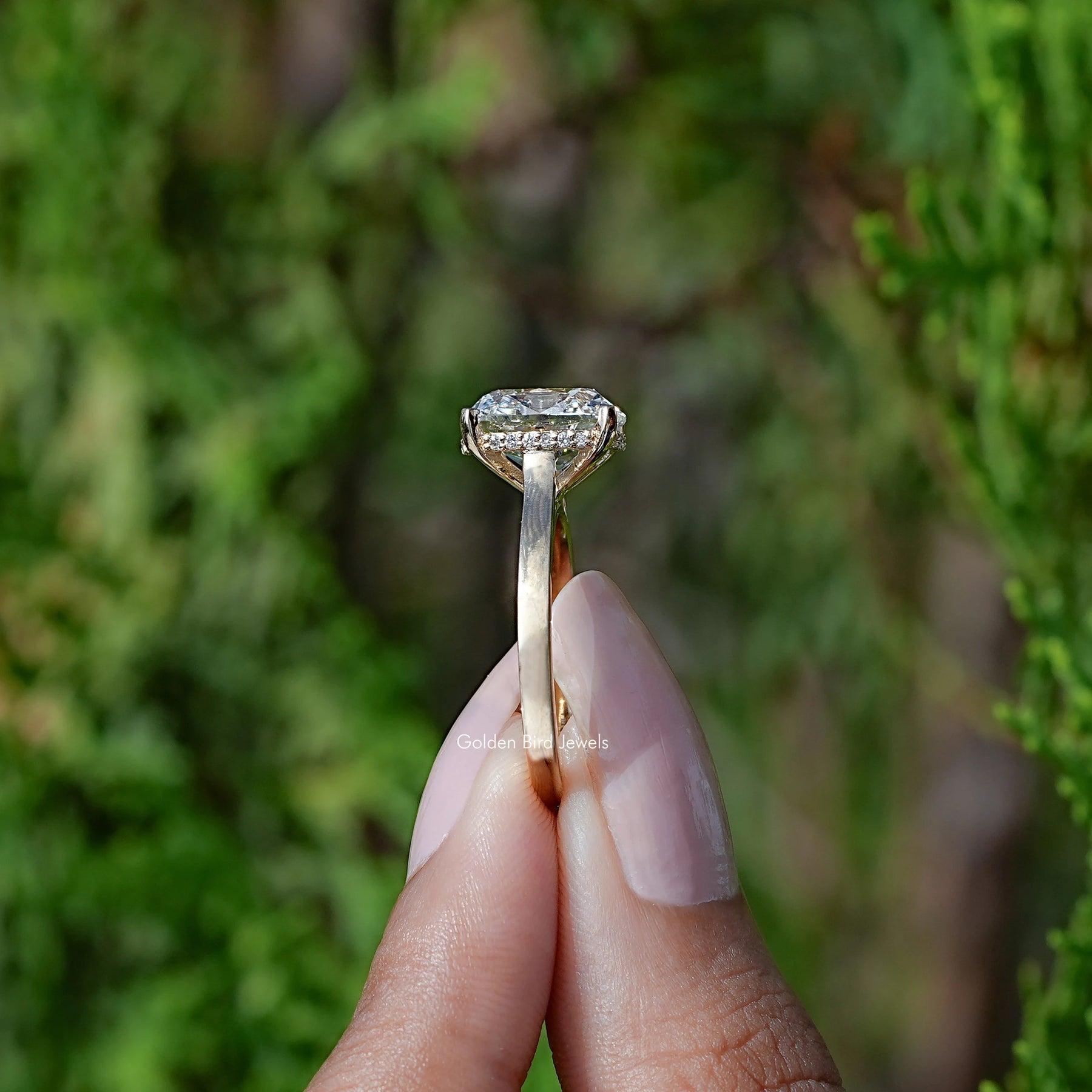 Side view of old mine cushion cut Ring in white gold