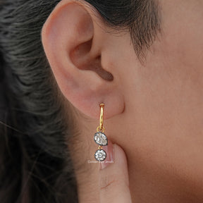 Detailed view of moissanite earrings in secure setting