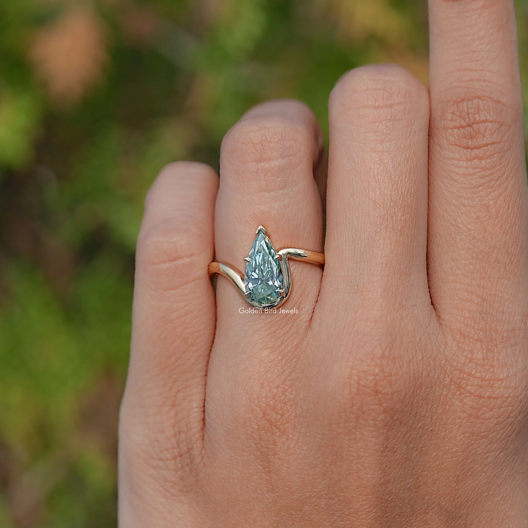 Top View Of Elongated Pear Solitaire Ring 
