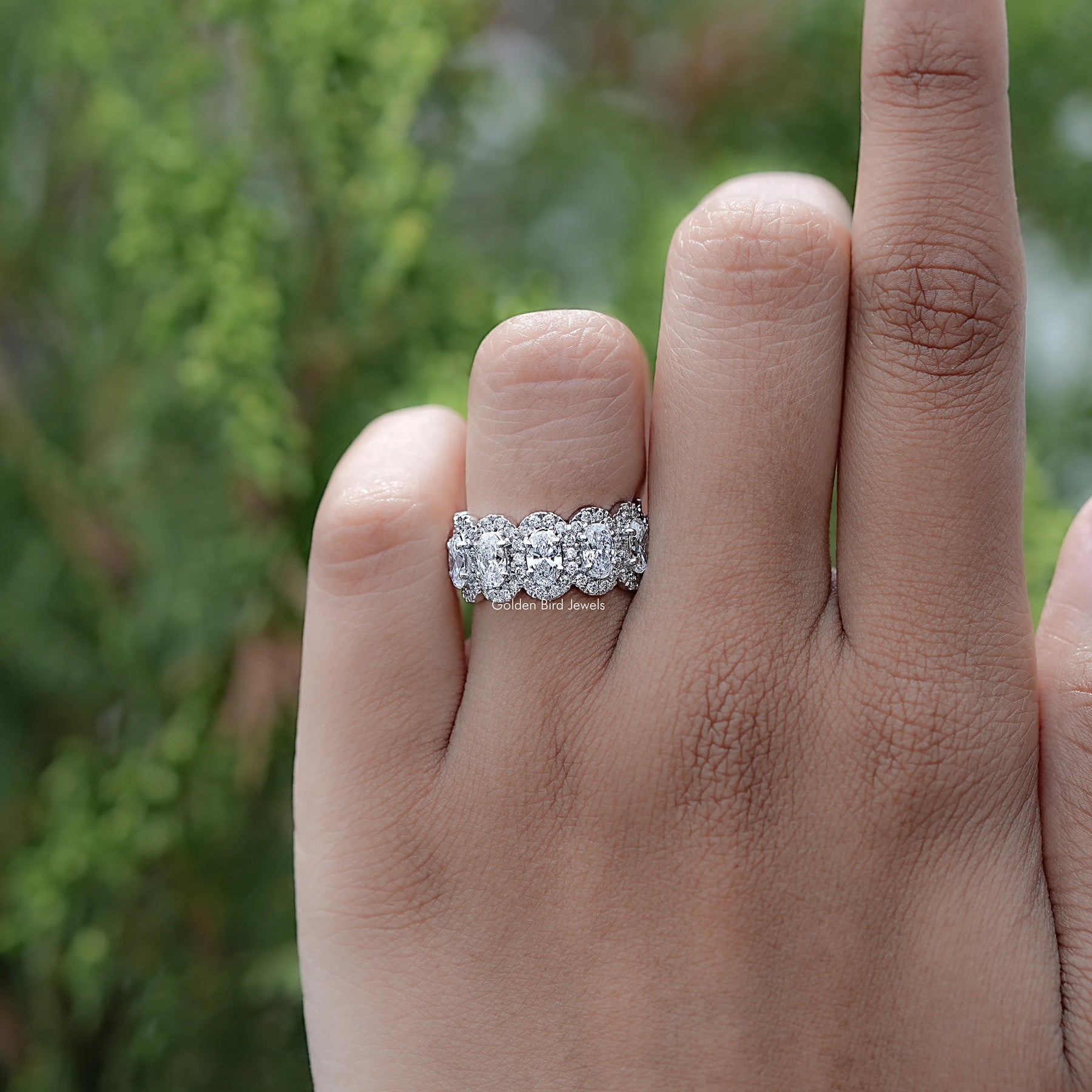 Front view of Oval Cut Lab Diamond Seven Stone Halo Band