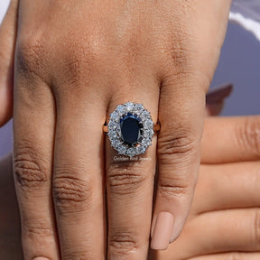 Close View Of Black Oval Cut Halo Engagement Ring
