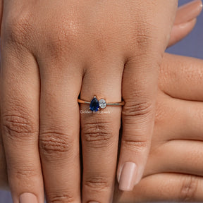 Detailed View Of Pear Cut Blue Gemstone Toi Et Moi Ring
