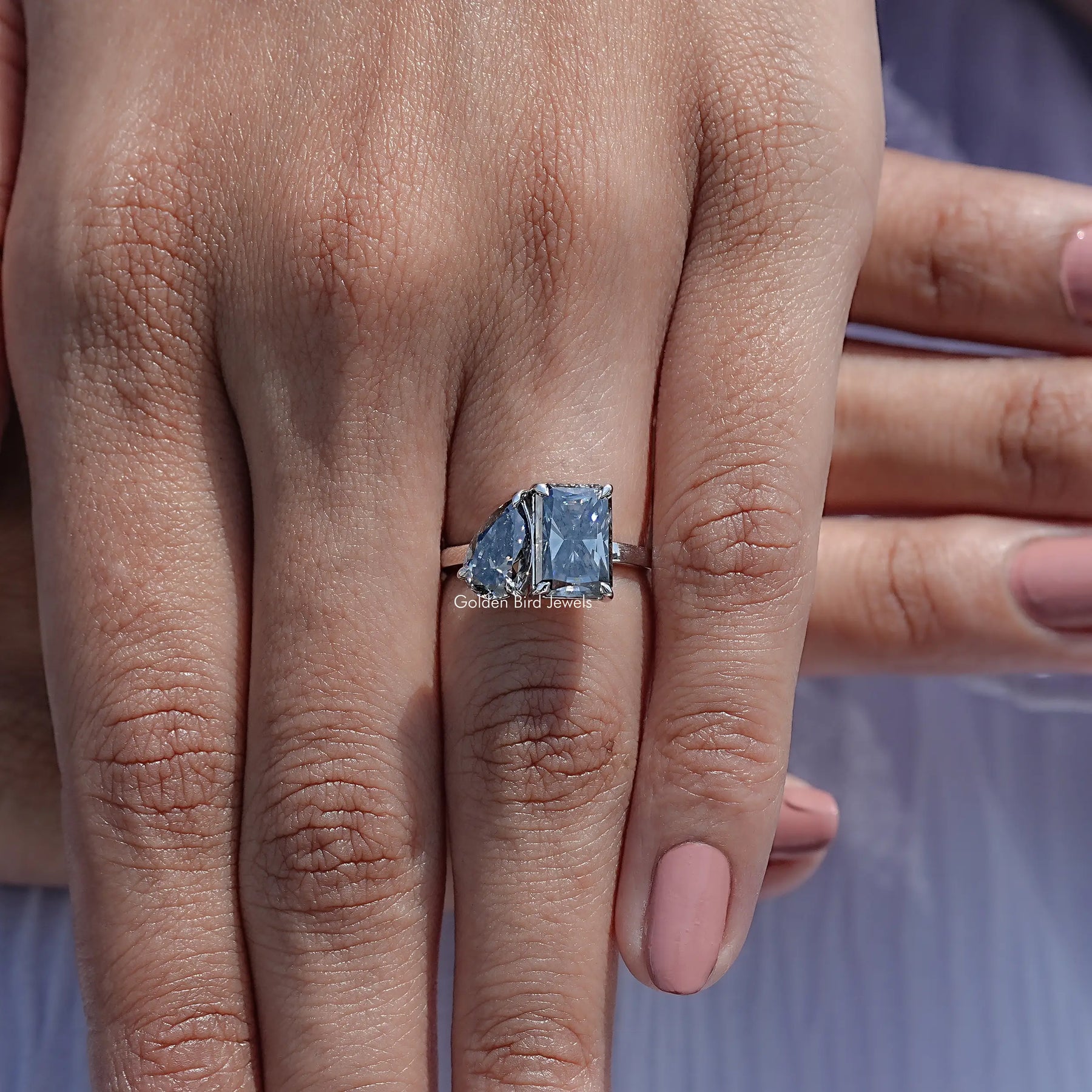 Detailed View Of Pear and Radiant Cut Toi Et Moi Ring
