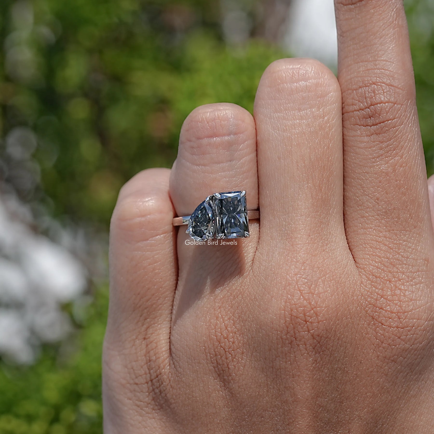 Top View Of Pear and Radiant Cut Toi Et Moi Moissanite Ring