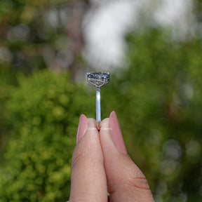 Side View Of Radiant And Pear Cut Moissanite Engagement Ring