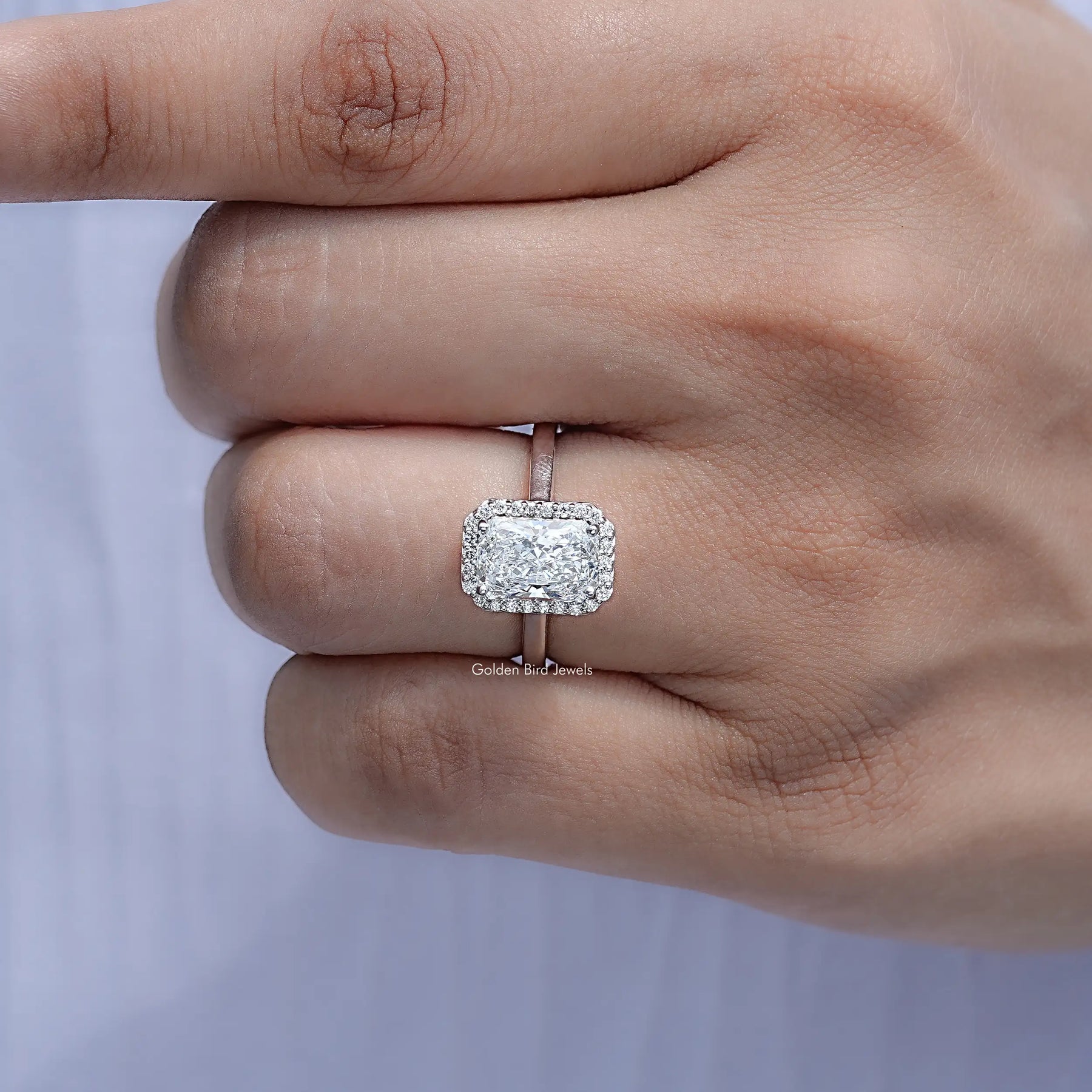 Close View Of Radiant Lab Diamond Halo Engagement Ring	
