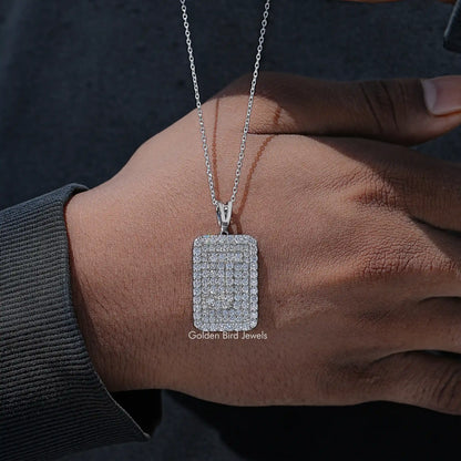 Square lab diamond pendant on silver chain, angled on wrist and arm