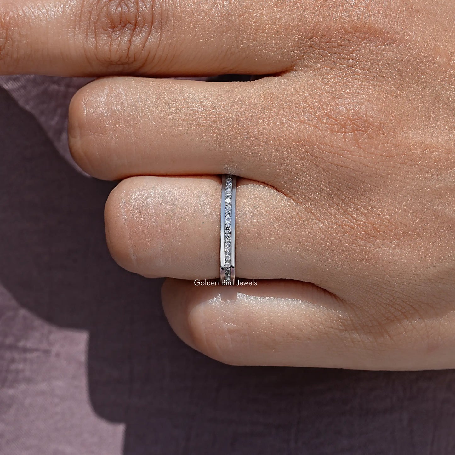 Round Cut Moissanite Channel Set Eternity Band