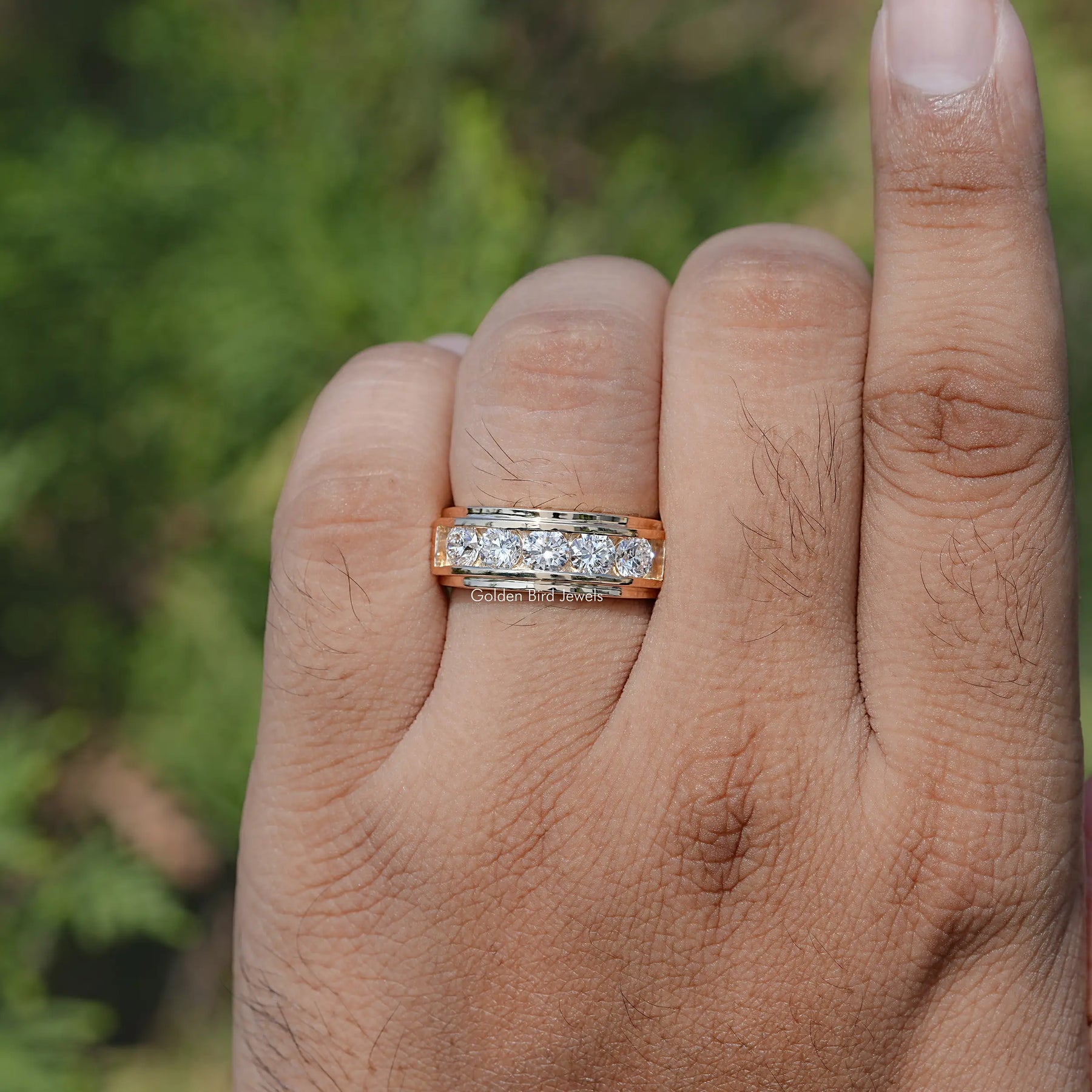 In finger front view of Lab Diamond Radiant Cut ring 