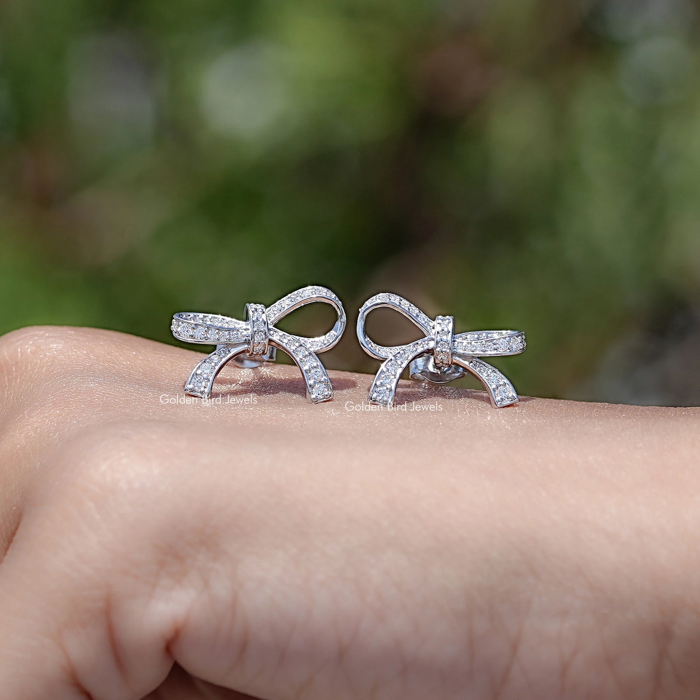 Pair Of a Round Cut Lab Diamond Ribbon Bow Stud Earrings