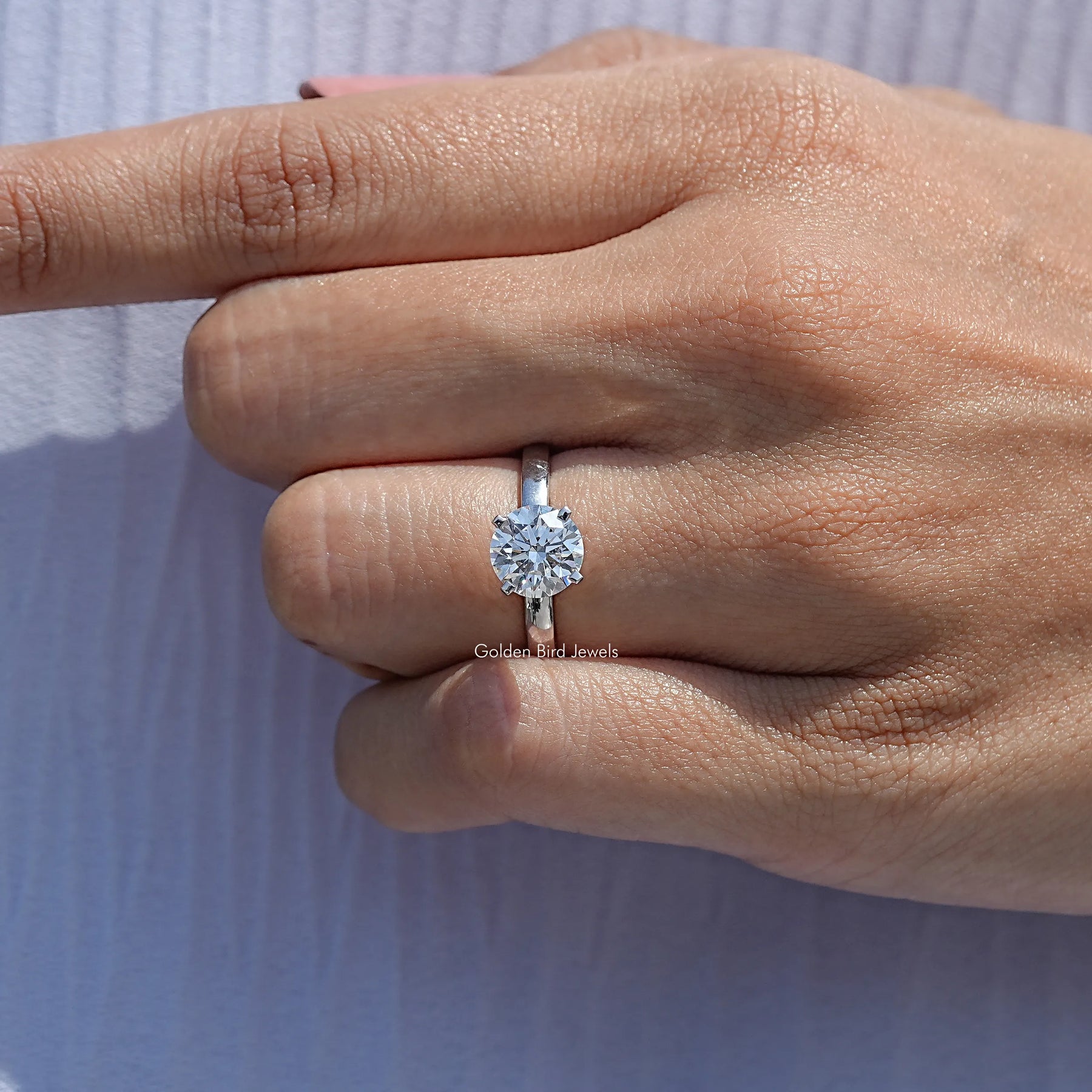 Close View Of Round Cut Lab Diamond Solitaire Engagement Ring
