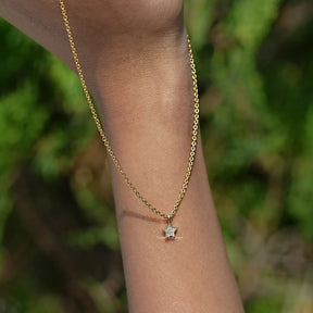 View of Round Cut Lab Diamond Pave Set Pendant​ In Women's hand's