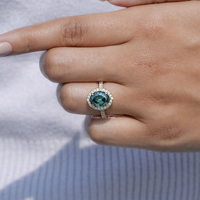 In finger front view of Moissanite Engagement Ring in Step Cut Oval Moissanite  in unique shape