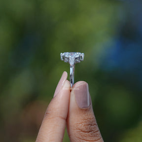 In hand showing view of lab diamond Ring	 		
