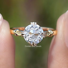 Front view of Old European Round Moissanite Accent Ring Set in two fingers 